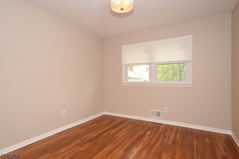 511 Scotland Road South Orange, NJ 07079 - Photo 13 of 26 an empty room with a window
