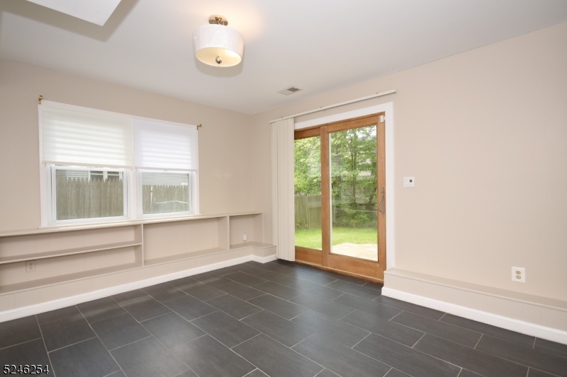 511 Scotland Road South Orange, NJ 07079 - Photo 17 of 26 an empty room with windows