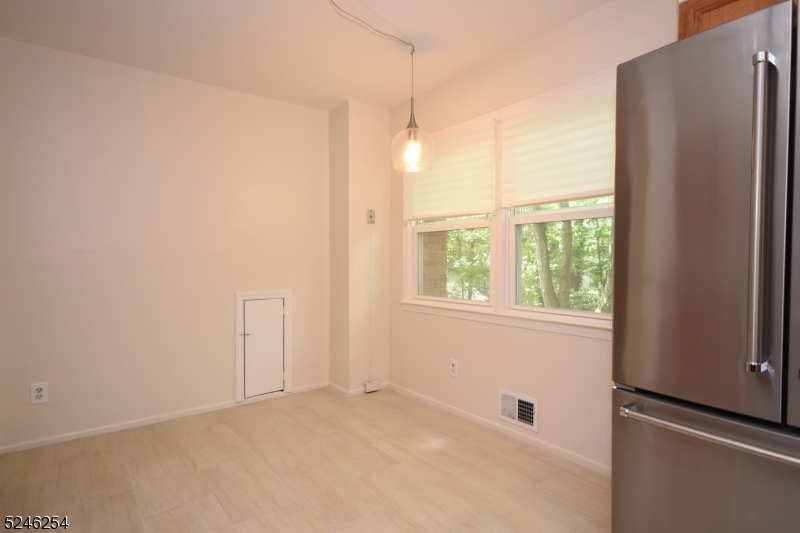 511 Scotland Road South Orange, NJ 07079 - Photo 9 of 26 a view of an empty room with a window