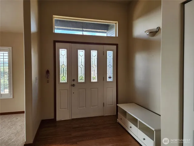 a view of front door with hallway