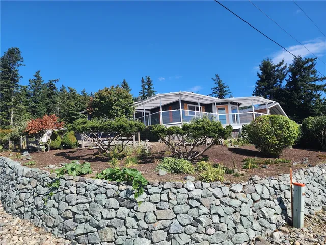 a house view with a garden space