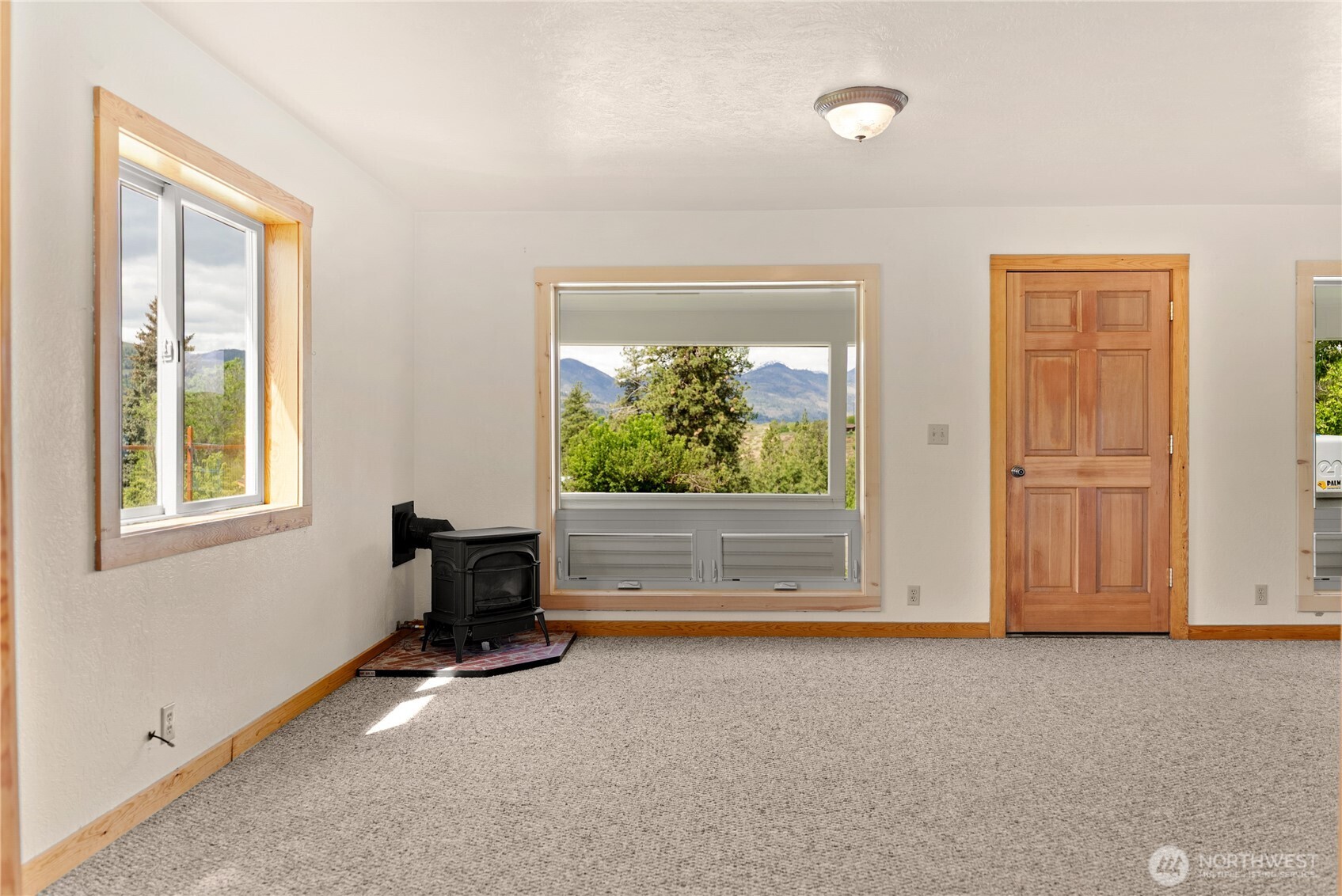 511 Bluff Street Winthrop, WA 98862 - Photo 31 of 38 a view of a livingroom with furniture and a window