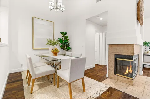 a kitchen with stainless steel appliances granite countertop a sink a stove a microwave and cabinets