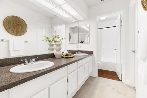 an aerial view of a house with swimming pool