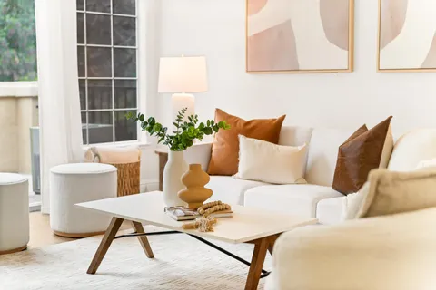 a dining room with furniture and a fireplace