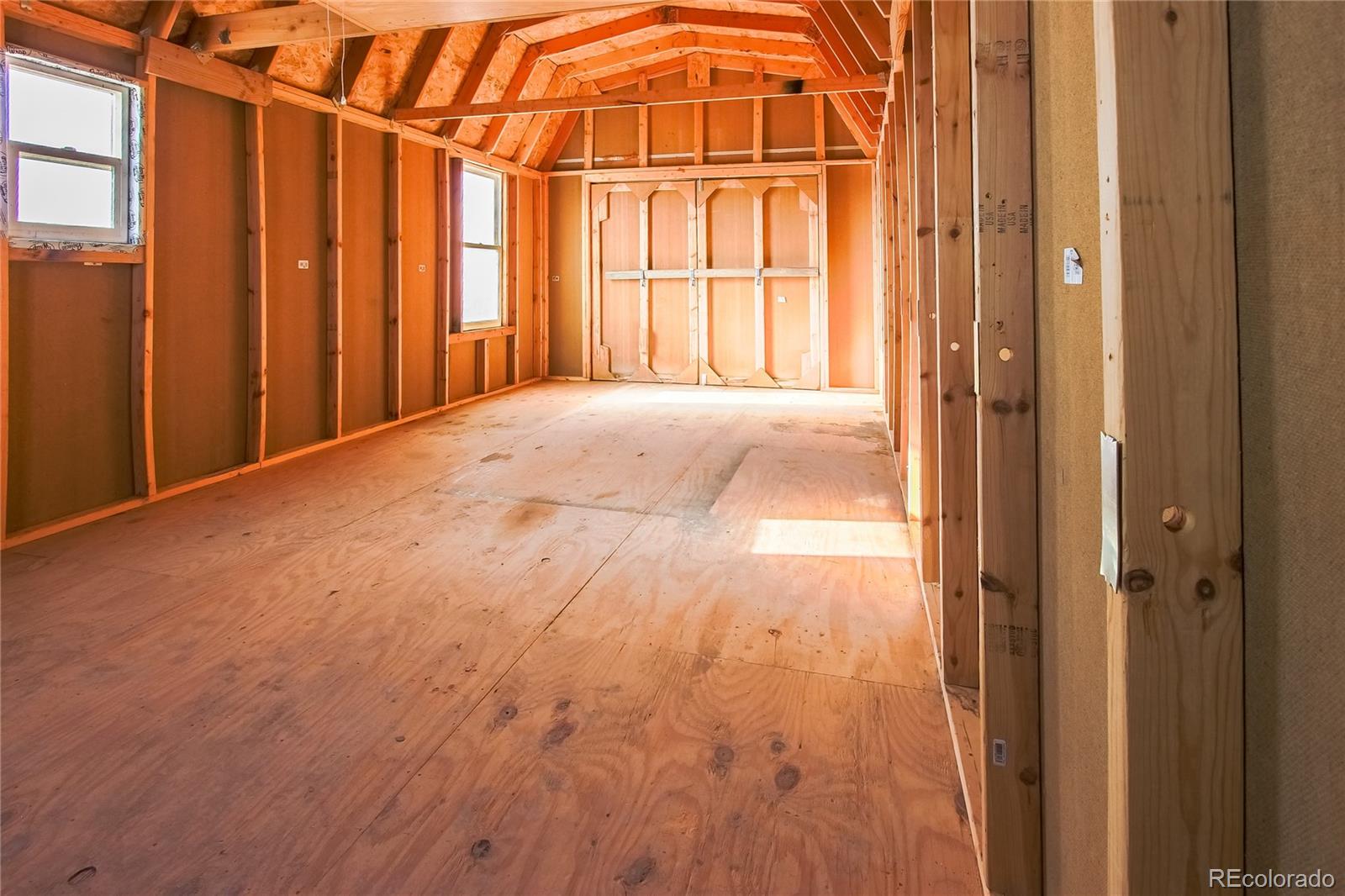 320 Morning Star Road Rye, CO 81069 - Photo 15 of 34 a view of an empty room with windows