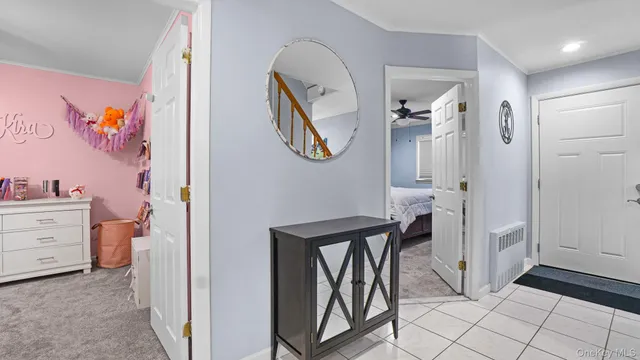 a view of hall way with furniture