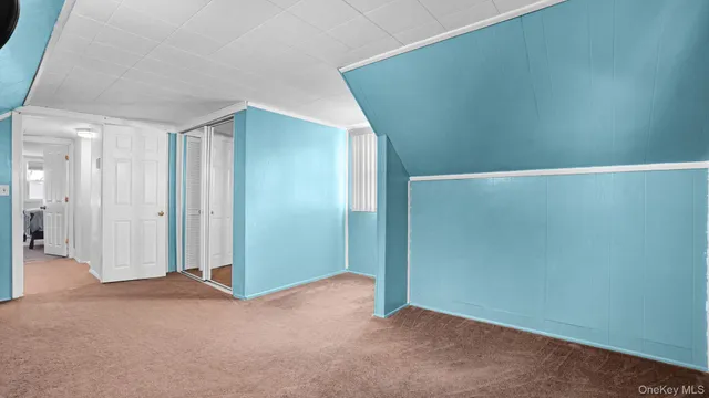 an empty room with closet