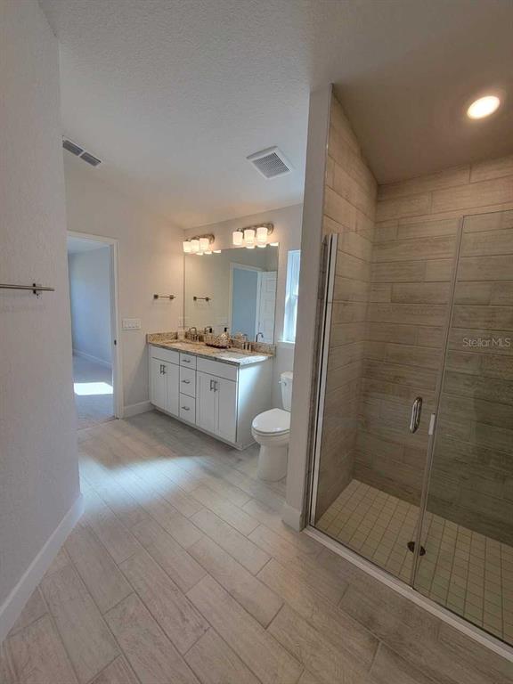 4465 Southwest 91st Ln Road Ocala, FL 34476 - Photo 18 of 42 a bathroom with a bathtub and a shower