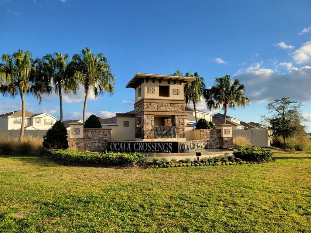 4465 Southwest 91st Ln Road Ocala, FL 34476 - Photo 27 of 42 a front view of a house with a yard
