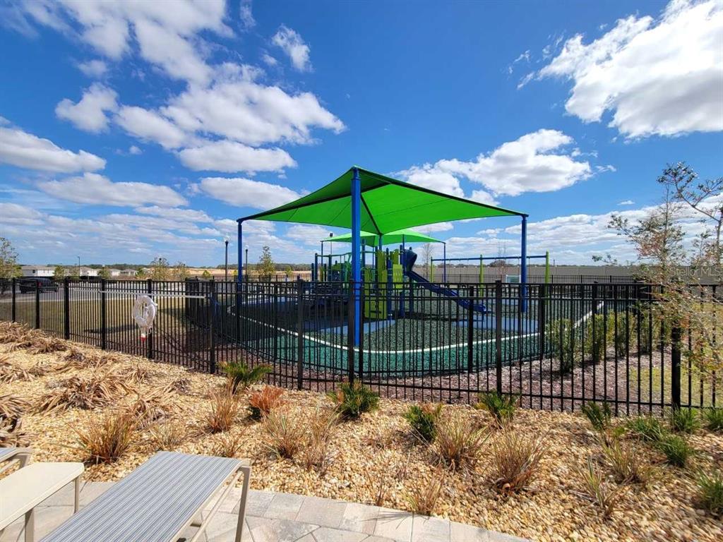 4465 Southwest 91st Ln Road Ocala, FL 34476 - Photo 38 of 42 a view of a backyard