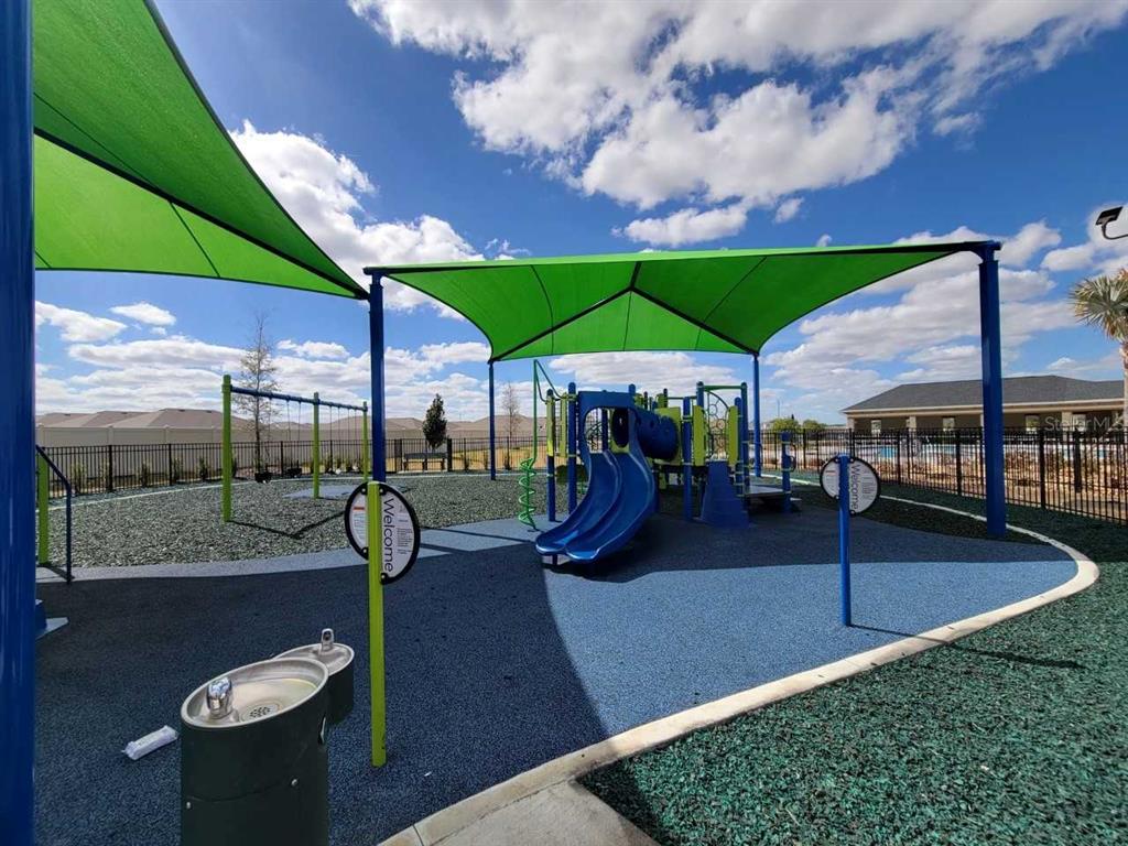 4465 Southwest 91st Ln Road Ocala, FL 34476 - Photo 39 of 42 a view of a backyard with sitting area and furniture