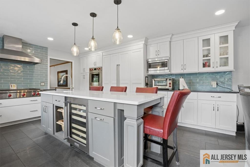 167 Federal Road Monroe Township, NJ 08831 - Photo 13 of 46 a kitchen that has a lot of cabinets in it and appliances