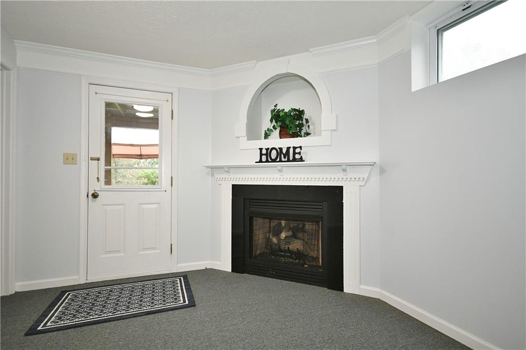 1076 Rural Ridge Drive Cheswick, PA 15024 - Photo 32 of 37 a view of an empty room with a window and fire place