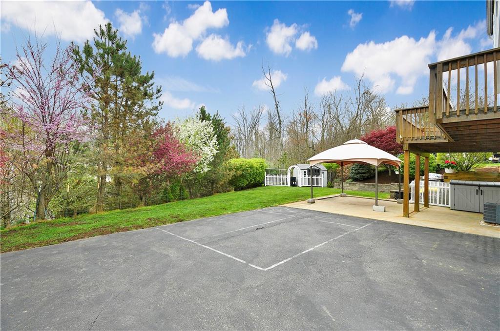 1076 Rural Ridge Drive Cheswick, PA 15024 - Photo 36 of 37 a view of an outdoor space and basketball court