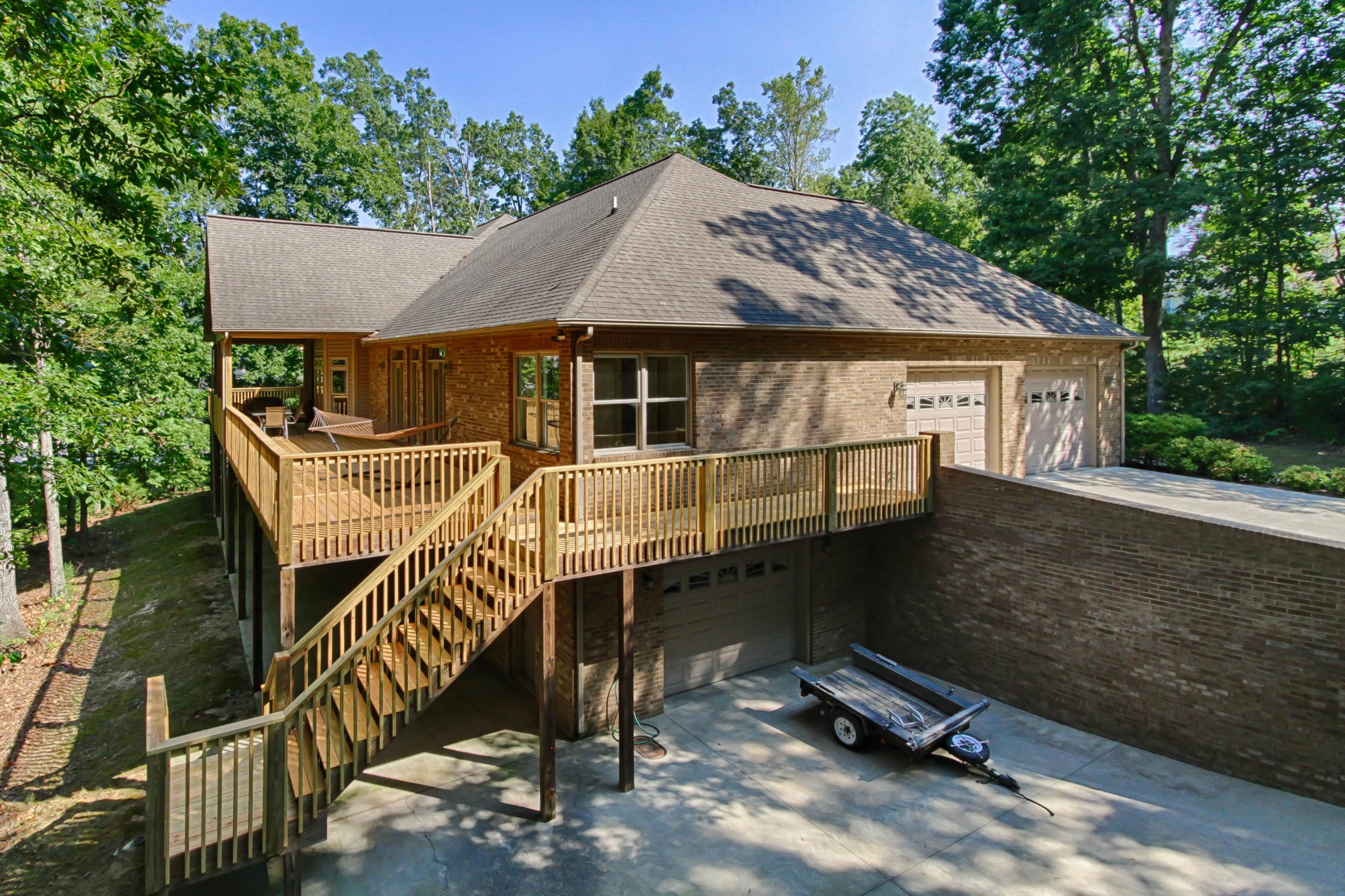 600 Baye Road Rutledge, TN 37861 - Photo 2 of 34 a house with trees in front of it