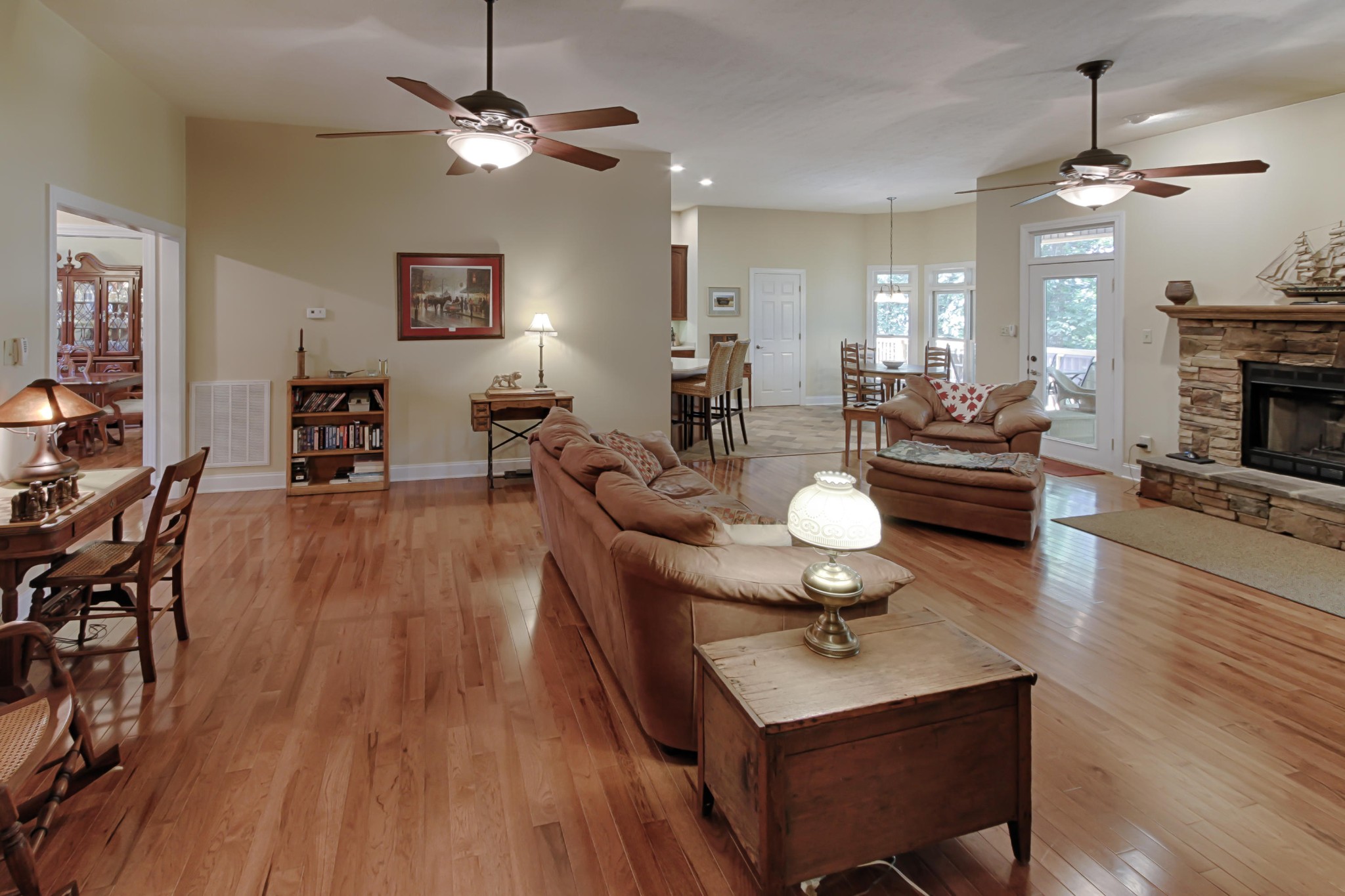 600 Baye Road Rutledge, TN 37861 - Photo 7 of 34 a living room with furniture a fireplace and a chandelier