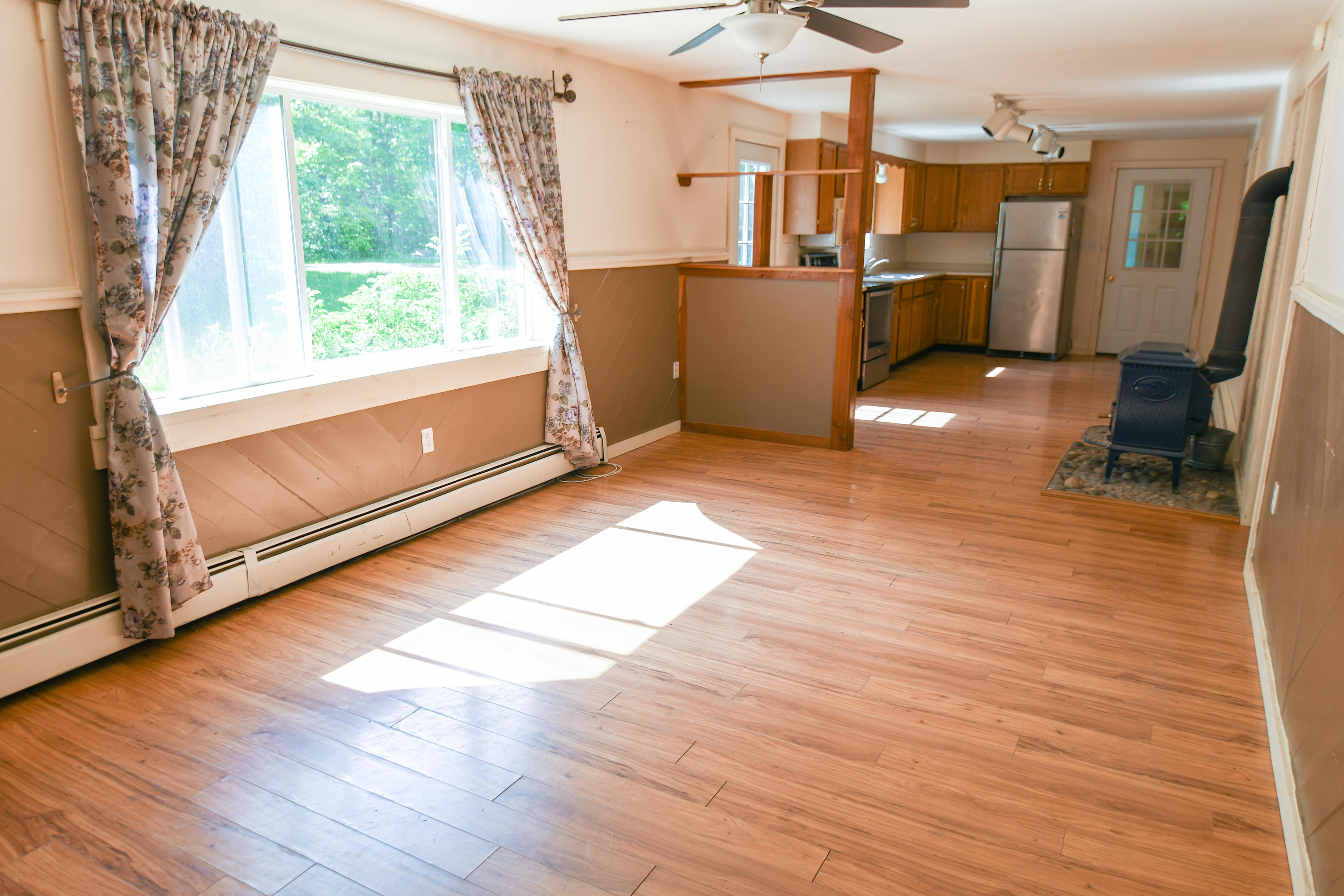 129 Files Hill Road Thorndike, ME 04986 - Photo 7 of 21 Living Room to Kitchen
