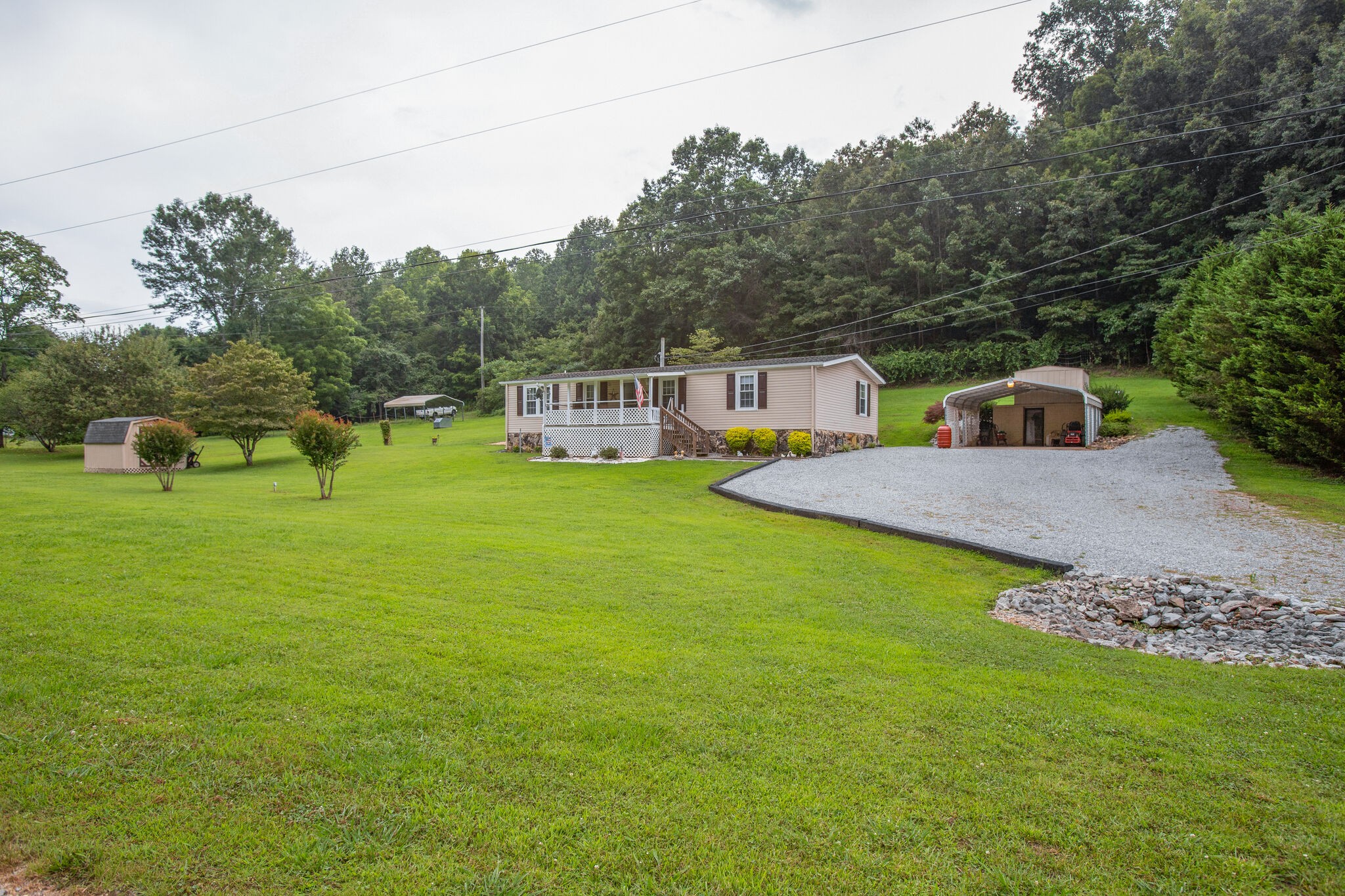 56 Morgan Road Lawrenceburg, TN 38464 - Photo 2 of 30 a view of a house with a yard