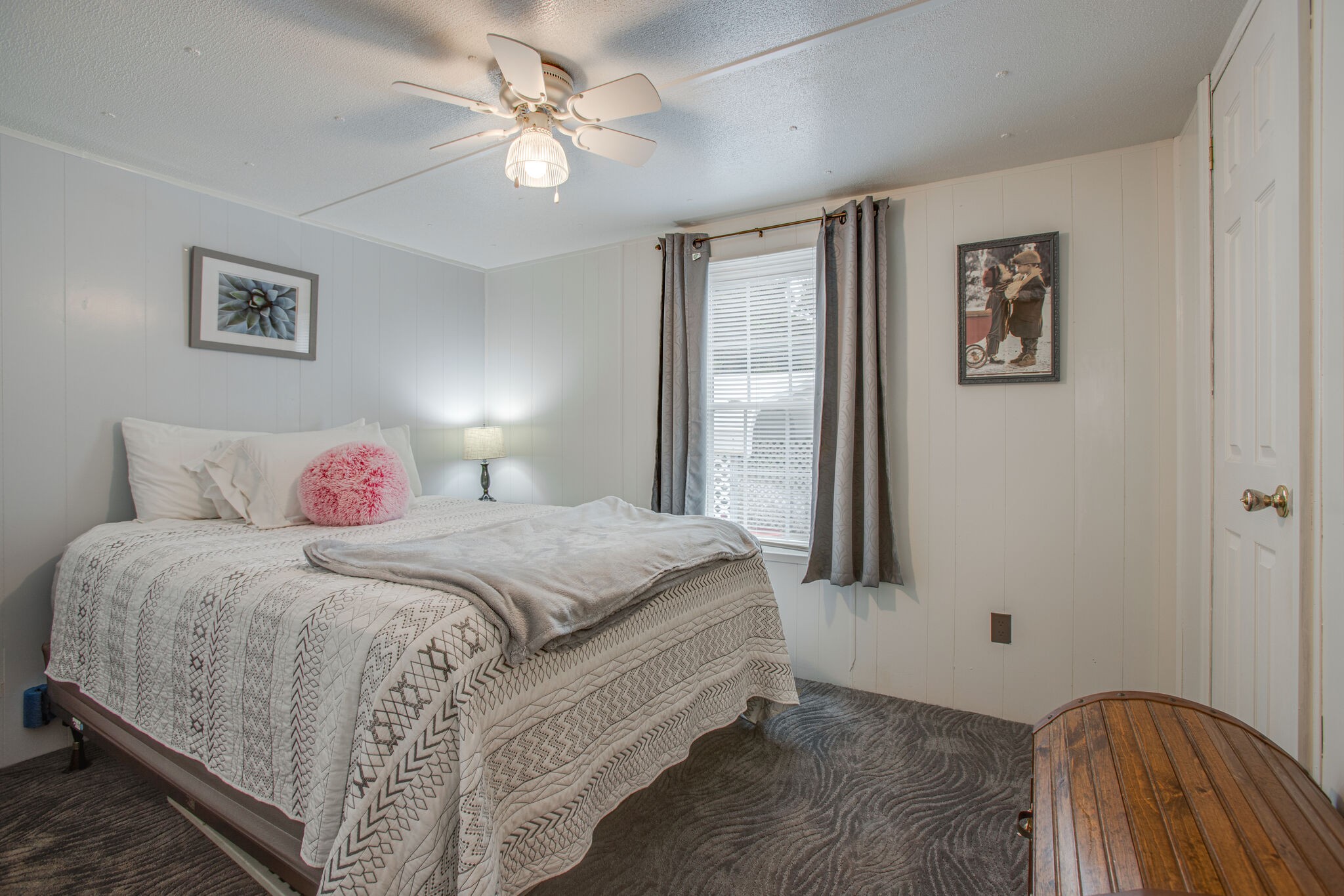56 Morgan Road Lawrenceburg, TN 38464 - Photo 23 of 30 a bedroom with a bed and a chandelier