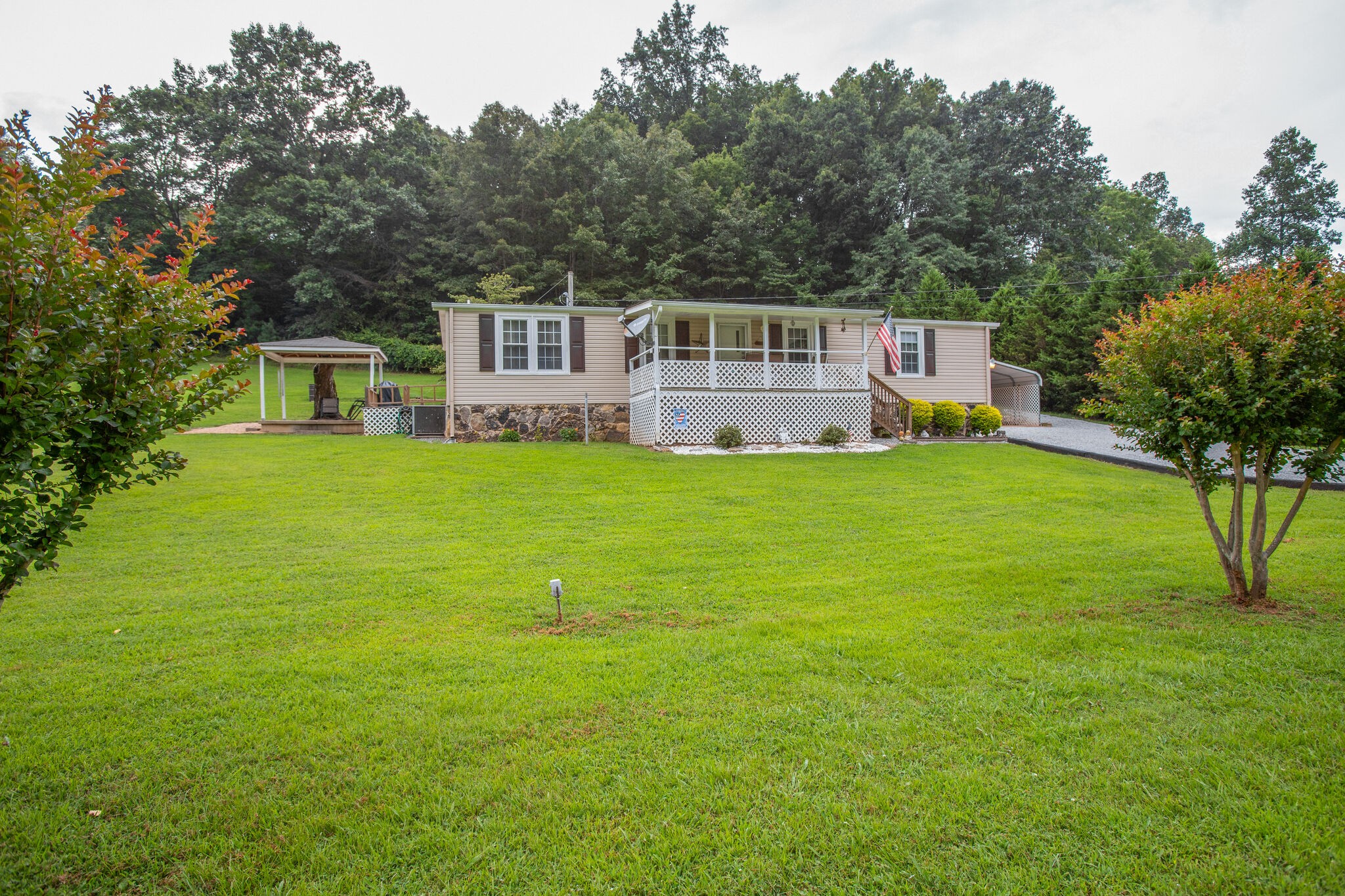 56 Morgan Road Lawrenceburg, TN 38464 - Photo 5 of 30 a front view of a house with a garden