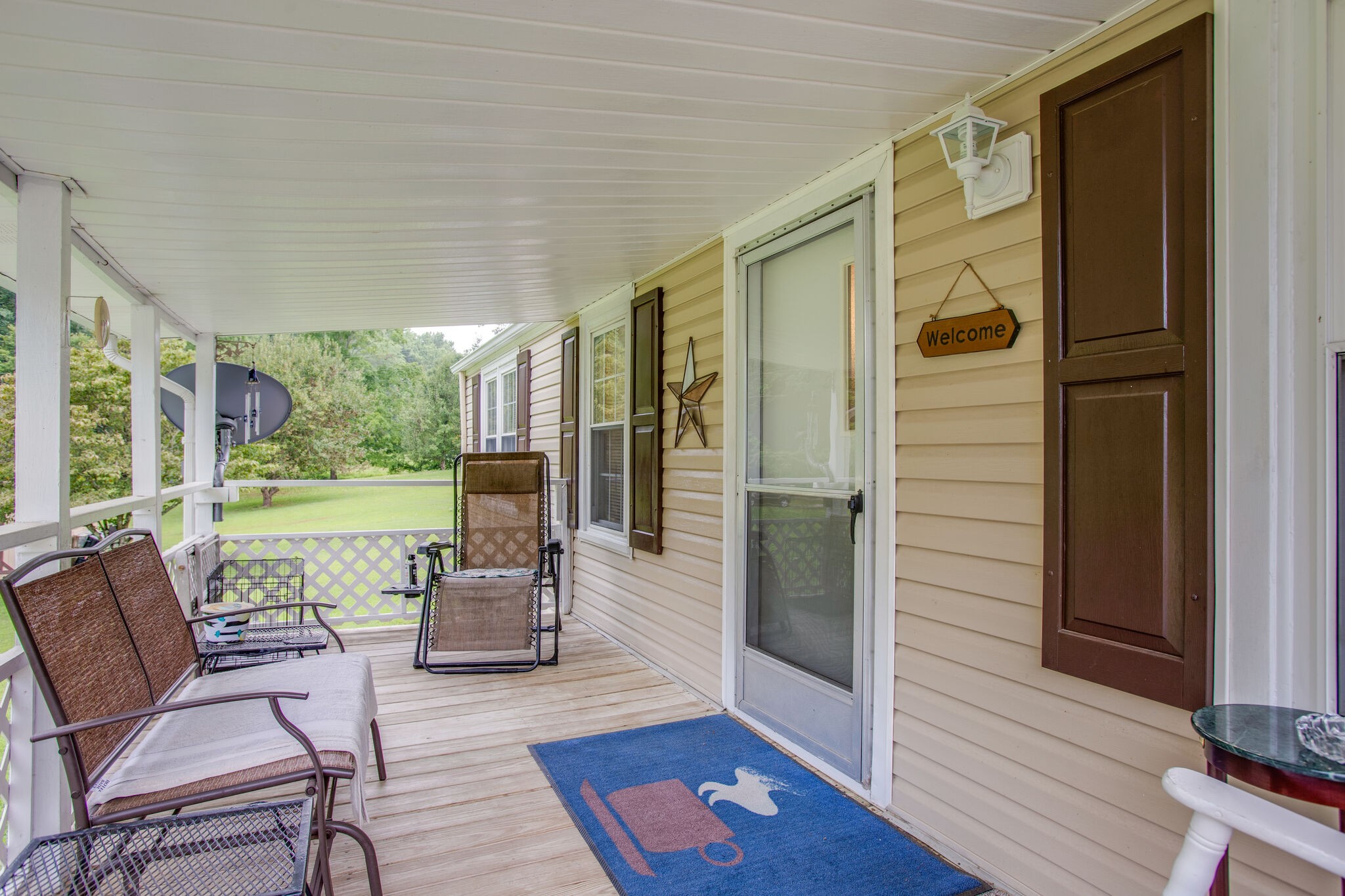 56 Morgan Road Lawrenceburg, TN 38464 - Photo 6 of 30 a living room with furniture and a floor to ceiling window