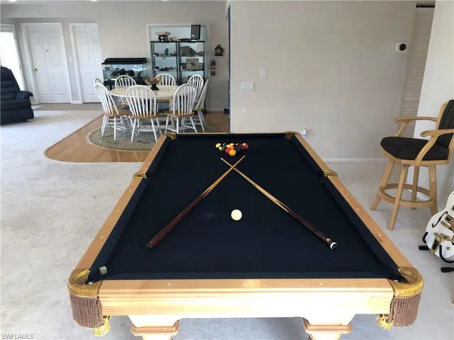 a view of a glass door with a roof deck