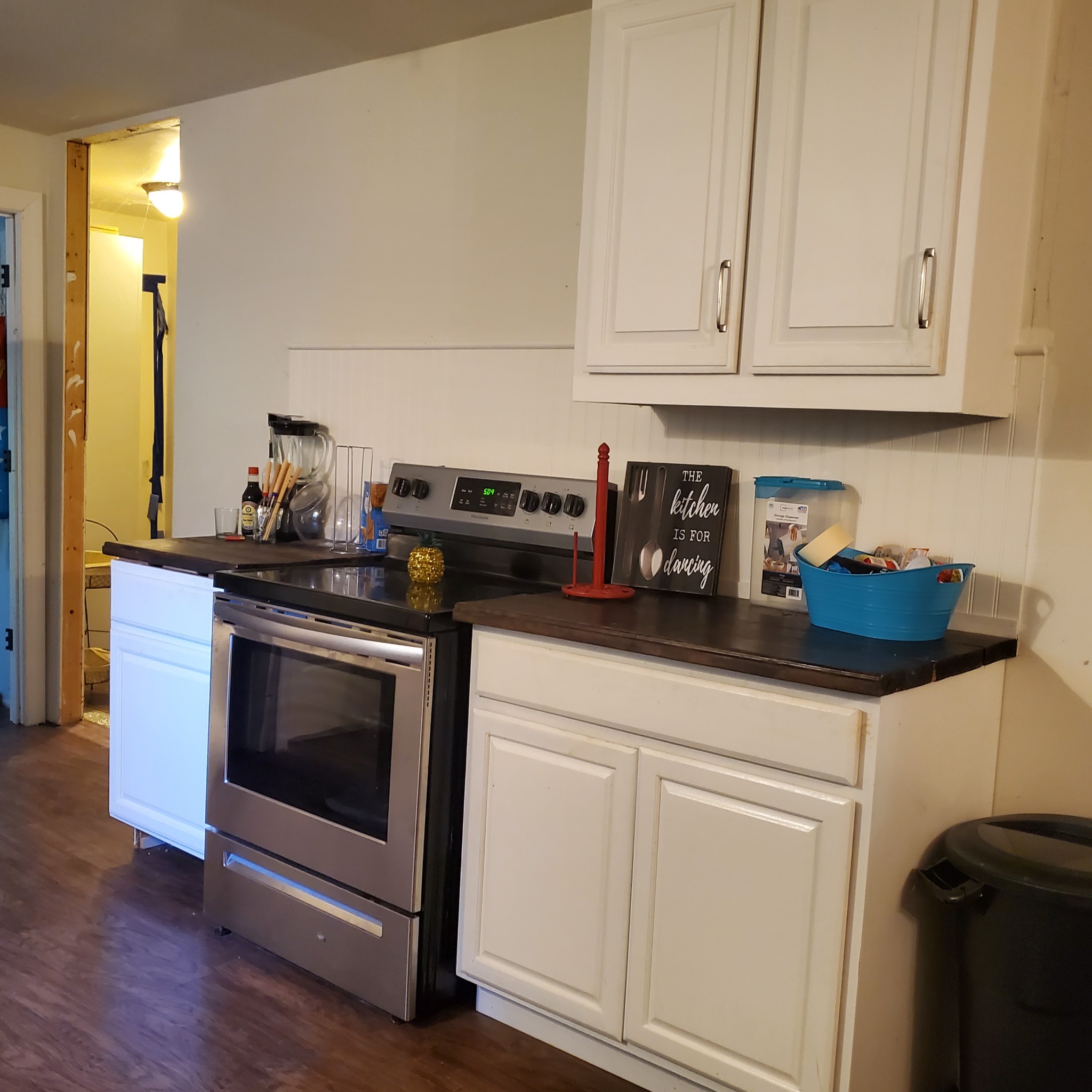 1019 Keytown Road Portland, TN 37148 - Photo 9 of 21 a kitchen with white cabinets and appliances