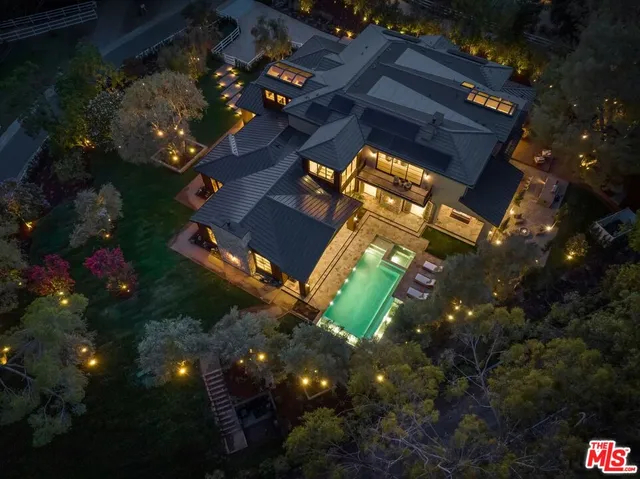 a outdoor living space with furniture and a fireplace