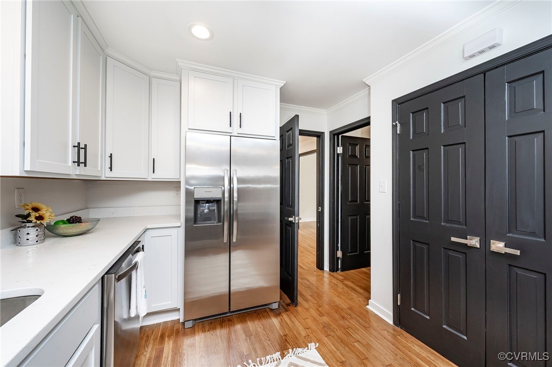 4117 Poplar Grove Road Midlothian, VA 23112 - Photo 11 of 31 a kitchen with stainless steel appliances granite countertop a refrigerator and a sink
