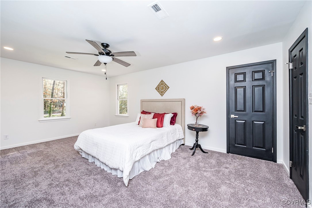 4117 Poplar Grove Road Midlothian, VA 23112 - Photo 21 of 31 a bedroom with a bed and window