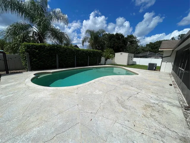 a view of outdoor space yard and swimming pool