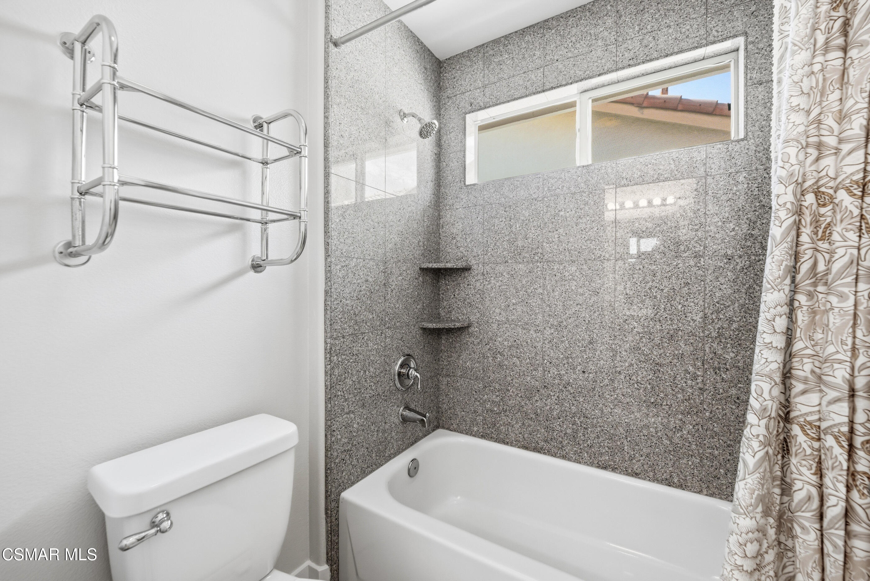 4884 Borders Street Simi Valley, CA 93063 - Photo 37 of 44 a bathroom with a shower and toilet