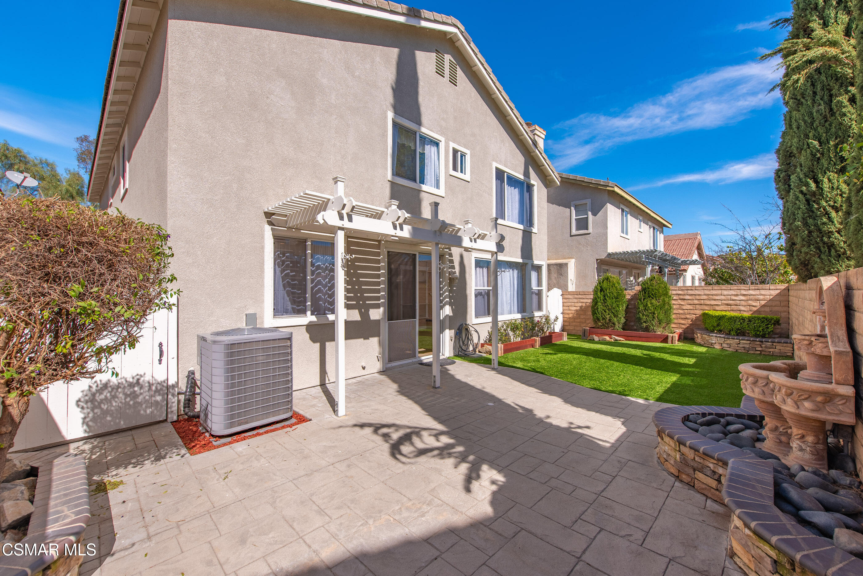 4884 Borders Street Simi Valley, CA 93063 - Photo 39 of 44 a view of a house with a yard