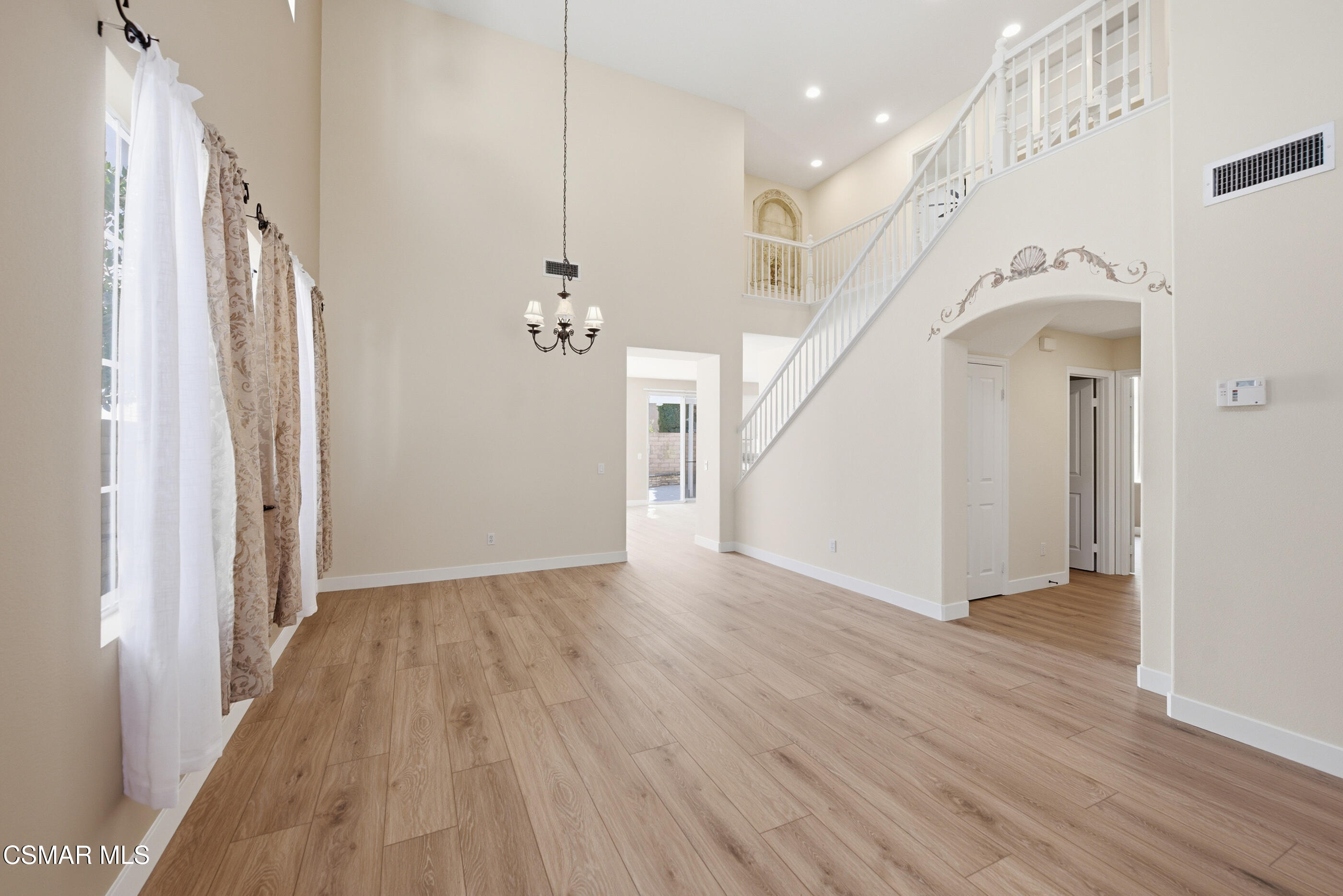 4884 Borders Street Simi Valley, CA 93063 - Photo 6 of 44 a view of an entryway with wooden floor