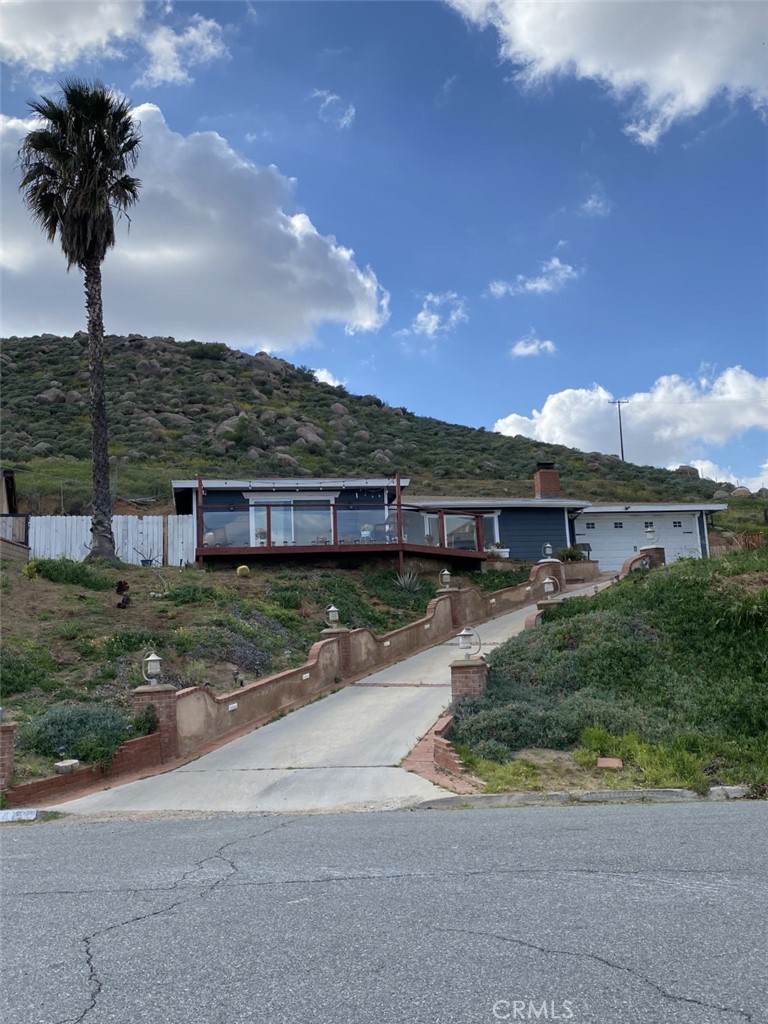 5415 Pinto Street Riverside, CA 92509 - Photo 1 of 1 a view of a house with a yard and table