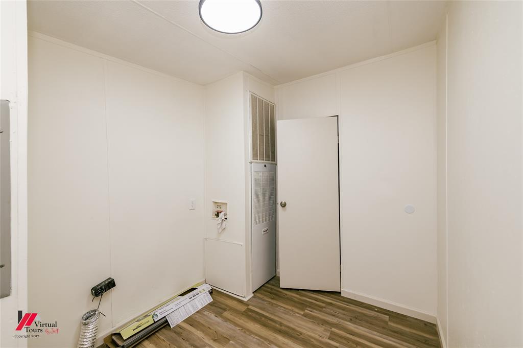 4947 Quiet Acres Road Shreveport, LA 71107 - Photo 32 of 39 Laundry room featuring hookup for a washing machine and wood finished floors