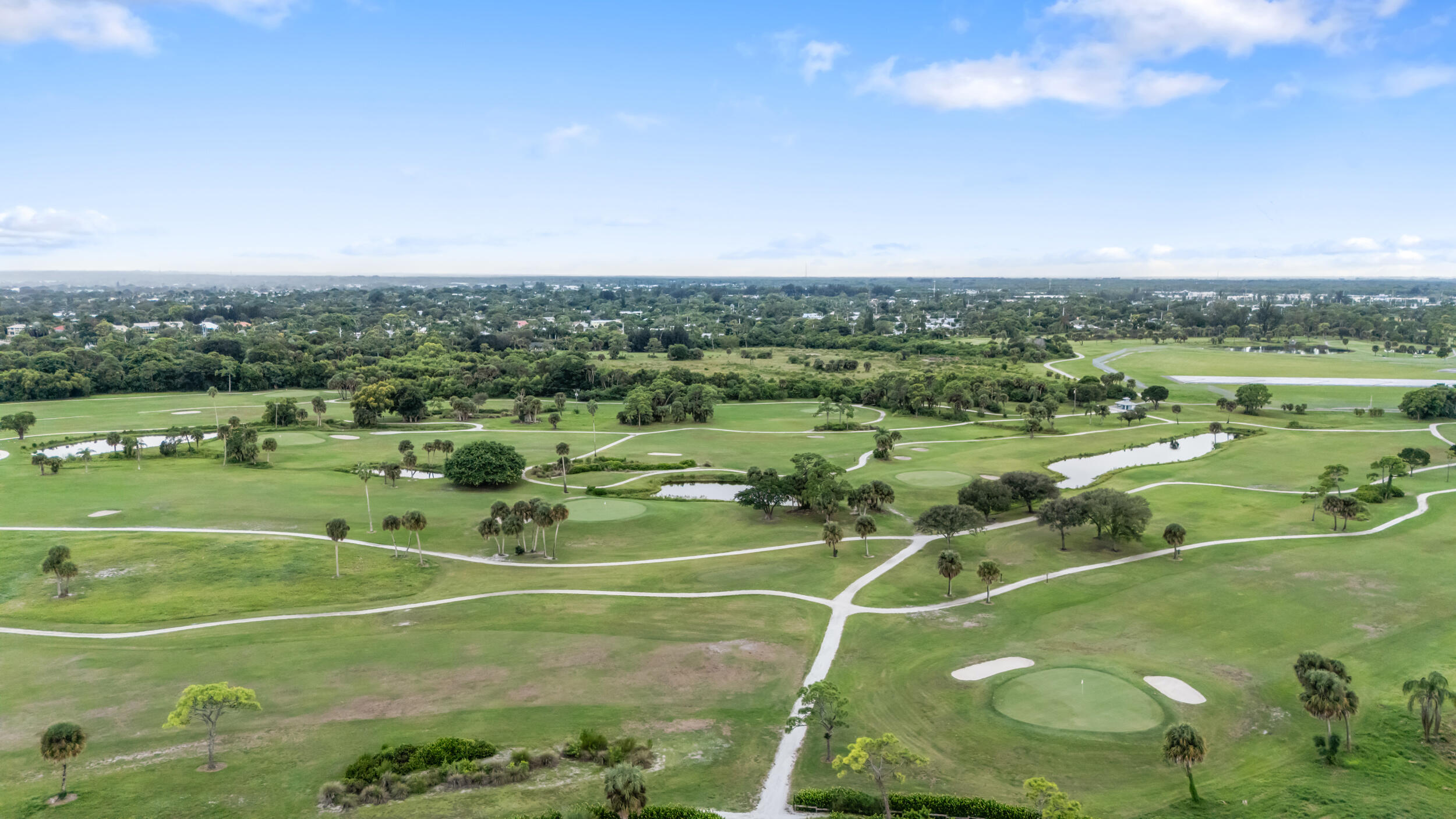 5345 Southeast 52nd Avenue Stuart, FL 34997 - Photo 27 of 32 a view of a tennis ground