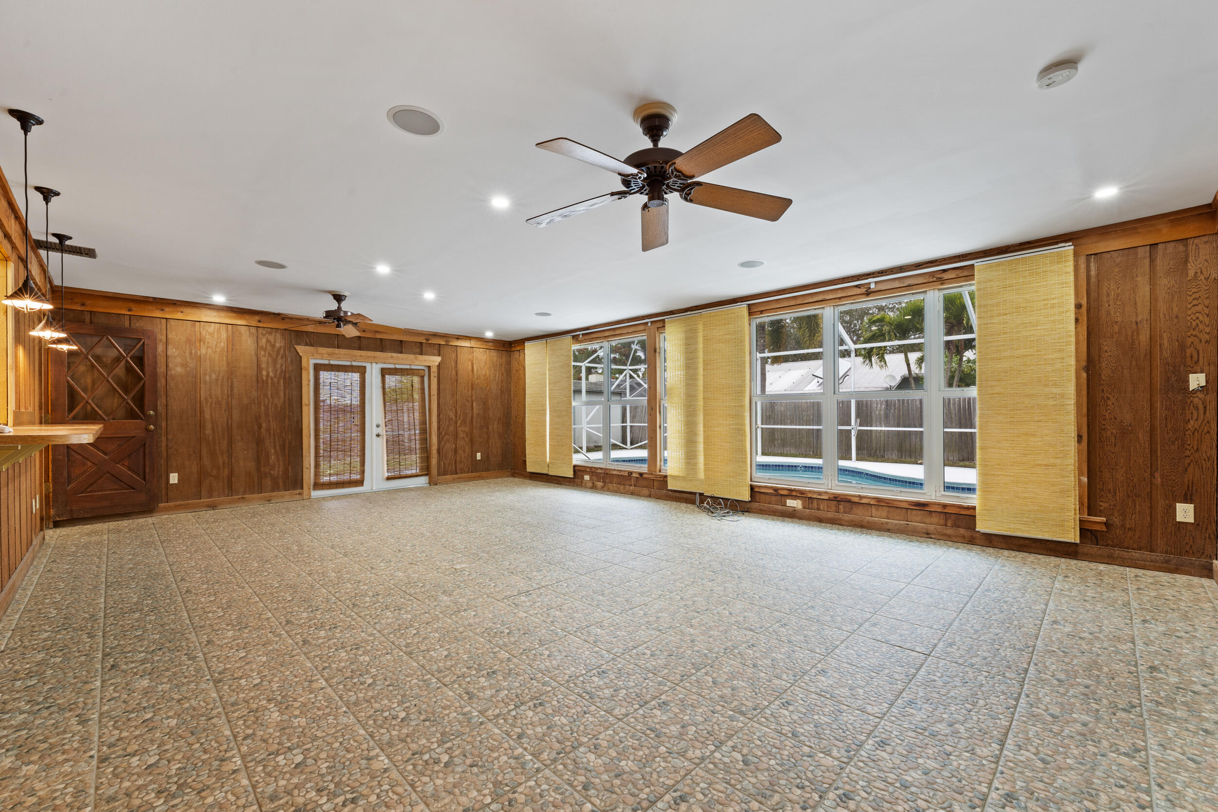 5345 Southeast 52nd Avenue Stuart, FL 34997 - Photo 7 of 32 a view of an empty room with a window