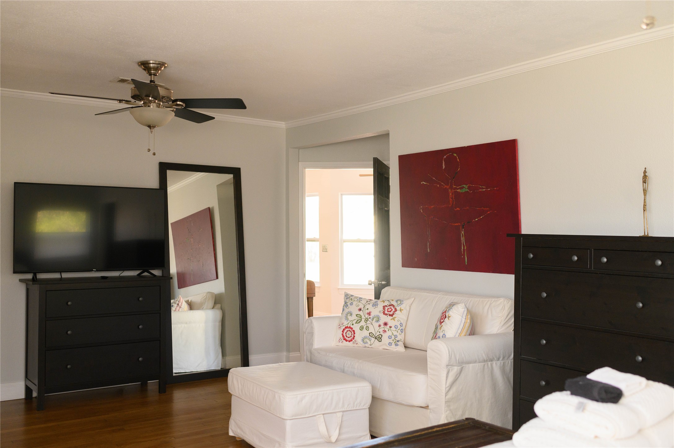 4902 Pecan Springs Road Austin, TX 78723 - Photo 31 of 40 a living room with furniture and a flat screen tv