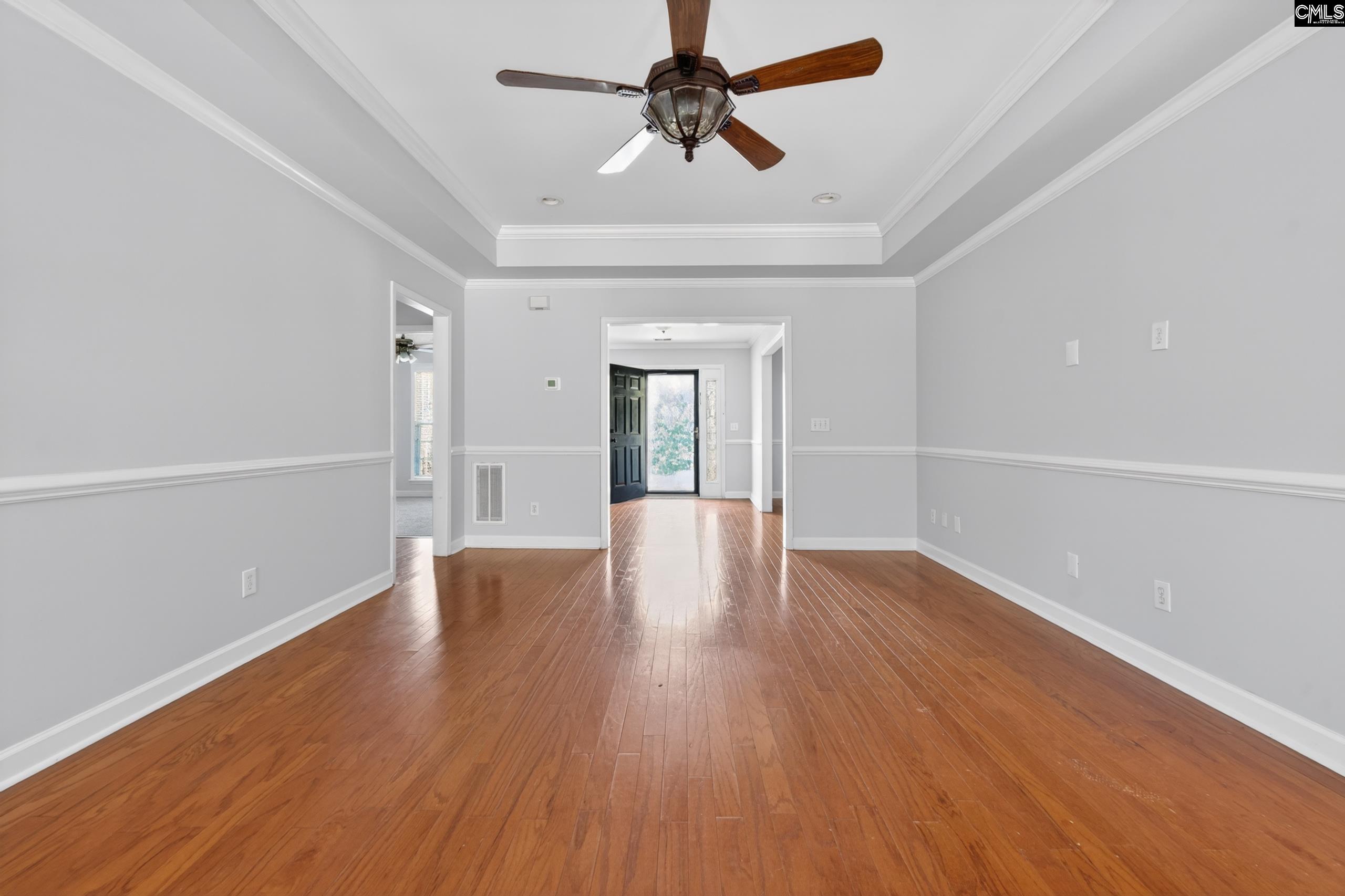 219 Plantation Pointe Drive Elgin, SC 29045 - Photo 30 of 56 a view of an empty room with window and wooden floor