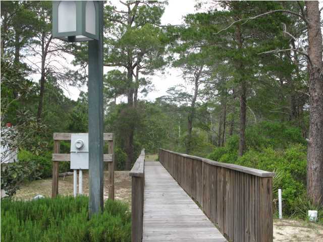 1 Lake Mist Ln Inlet Beach Inlet Beach, FL 32461 - Photo 5 of 7 a balcony with an outdoor space