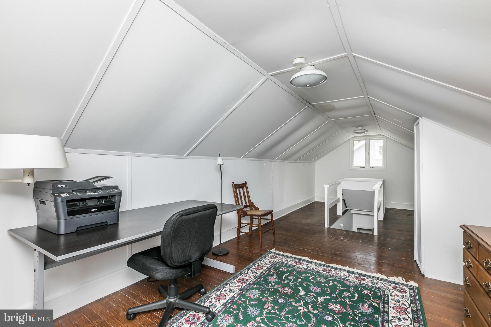 2414 Steele Road Baltimore, MD 21209 - Photo 11 of 24 a room with lots of chairs and a rug
