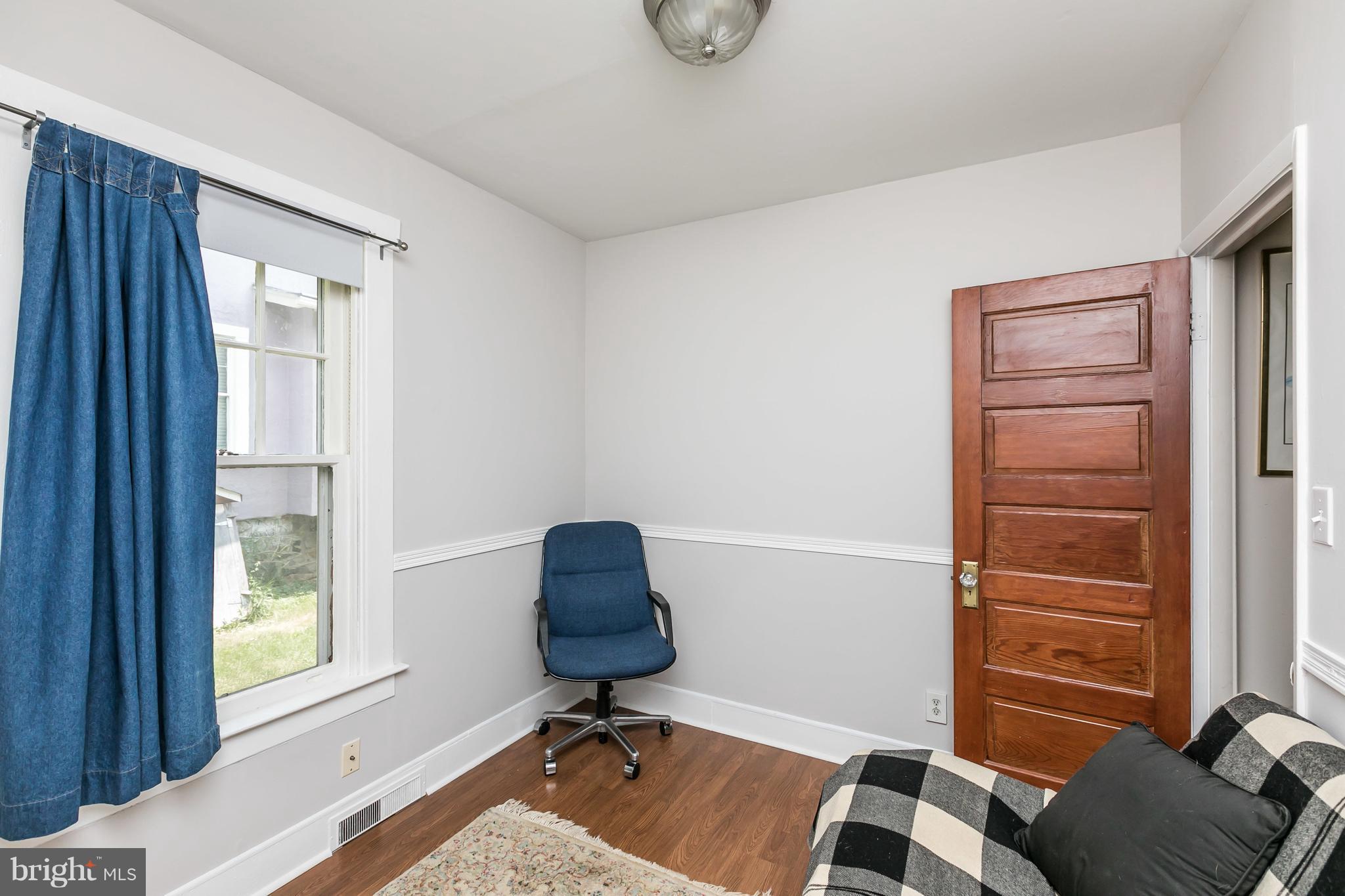 2414 Steele Road Baltimore, MD 21209 - Photo 17 of 24 a workspace with furniture and a window