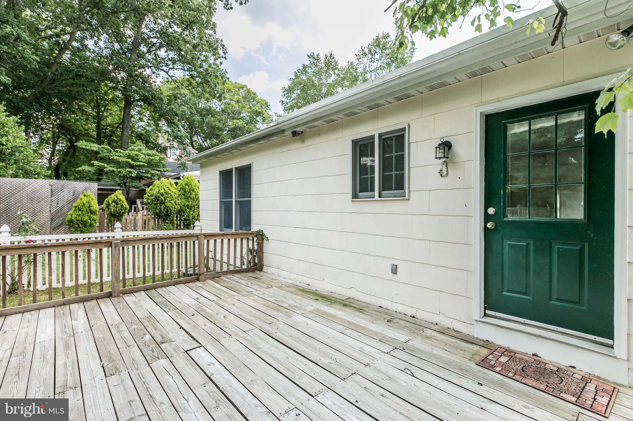 2414 Steele Road Baltimore, MD 21209 - Photo 22 of 24 a view of a wooden deck
