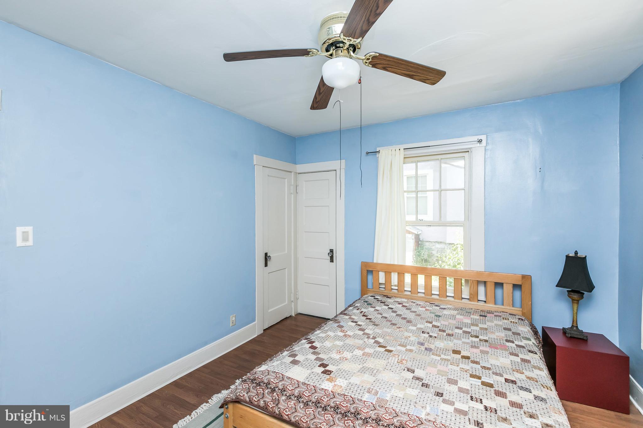 2414 Steele Road Baltimore, MD 21209 - Photo 9 of 24 a bedroom with a bed and a window