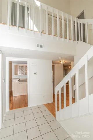 a view of an entryway with staircase