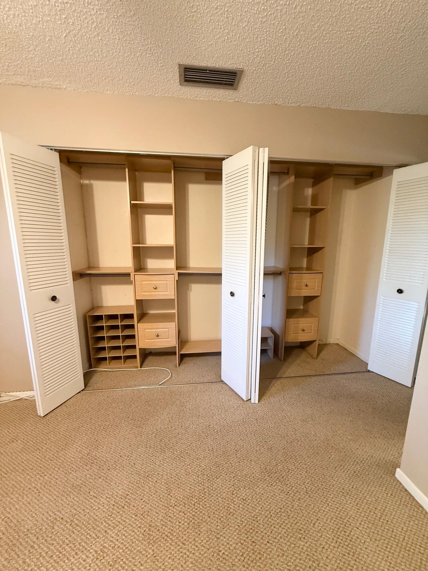 930 Southwest 9th St Circle, Unit 205 Boca Raton, FL 33486 - Photo 17 of 38 MAIN BEDROOM CLOSET
