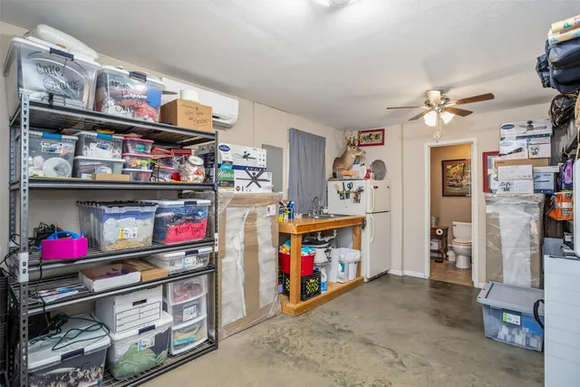 a view of a swimming pool with chairs
