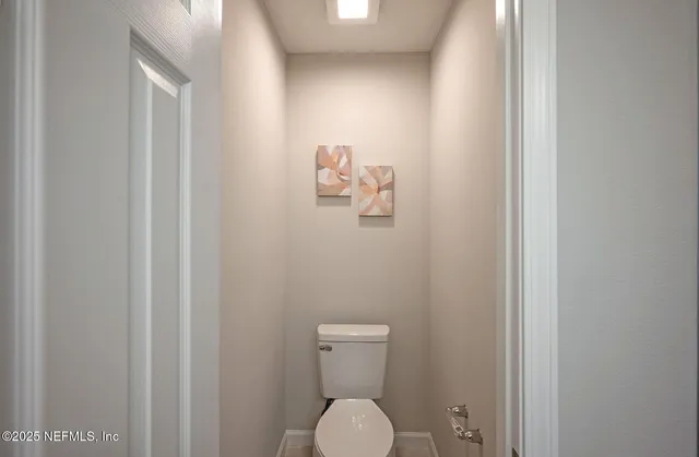 a bedroom with a bed and furniture